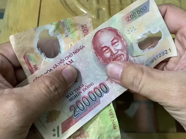 Vận mệnh thay đổi khi nằm mơ thấy tiền 200 nghìn